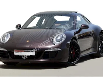 بورش  911  2015  2,855  كوبيه \ سبورت  اتوماتك  6  جلد  دفع كلي مستمر  بني  بنزين