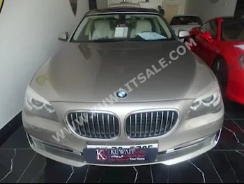 BMW  730 Li  7-Series  2014  60,000  Sedan  Automatic  6  Leather  RWD  Beige  Gasoline