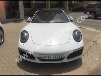Porsche  Carrera  911  2017  3,000  Coupe / Sport  Automatic  6  Leather  RWD  White  Gasoline