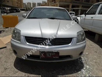 Mitsubishi  Galant  2007  190,000  Sedan  Automatic  4  Cloth  FWD  Silver  Gasoline