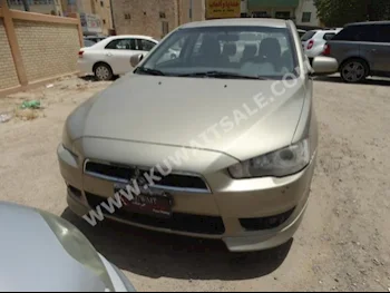 Mitsubishi  GLS  Lancer  2008  80,000  Sedan  Automatic  4  Cloth  FWD  Gold  Gasoline