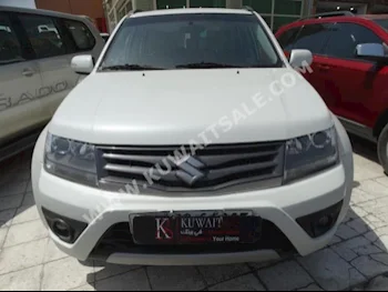 Suzuki  Grand Vitara  2014  115,000  SUV  Automatic  4  Cloth  4WD  White  Gasoline
