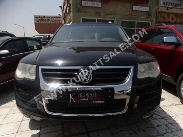 فوكس واغن  طوارق  2009  90,000  اس يو في  اتوماتك  6  مخمل  دفع رباعي  أسود  بنزين