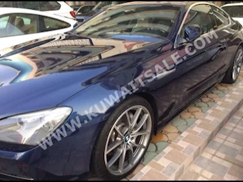 BMW  640i  6-Series  2014  86,000  Coupe / Sport  Automatic  6  Leather  RWD  Black  Gasoline