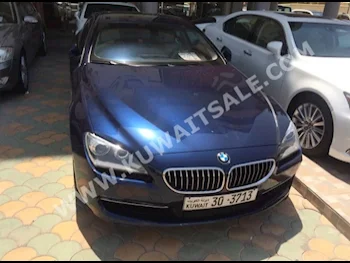 BMW  640i  6-Series  2014  86,000  Coupe / Sport  Automatic  6  Leather  RWD  Dark Blue  Gasoline