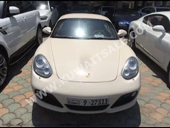 Porsche  Cayman S  Cayman  2009  108,000  Coupe / Sport  Automatic  6  Leather  RWD  Beige  Gasoline