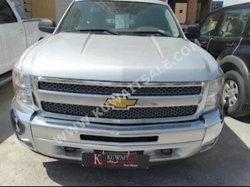 Chevrolet  LT  Silverado  2012  93,000  Pick Up  Automatic  8  Cloth  4WD  Silver  Gasoline