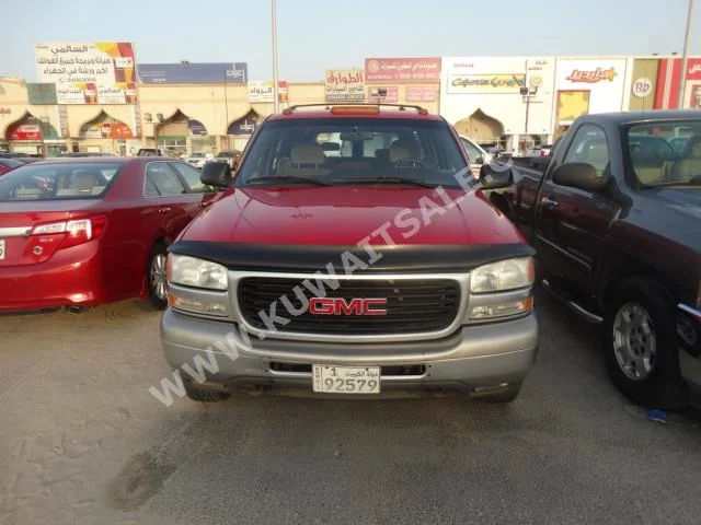 GMC  Suburban  2001  170,000  SUV  Automatic  8  Cloth  RWD  Red  Gasoline