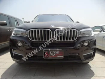 BMW  5  X-Series  2014  30,000  SUV  Automatic  6  Leather  4WD  Black  Gasoline