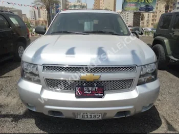 Chevrolet  LT  Tahoe  2012  110,000  SUV  Automatic  8  Cloth  RWD  Silver  Gasoline