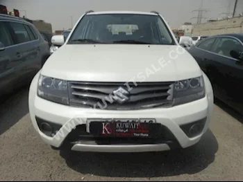 Suzuki  Grand Vitara  2014  60,000  SUV  Automatic  4  Leather  4WD  White  Gasoline