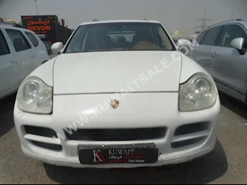 Porsche  S  Cayenne  2005  190,000  SUV  Automatic  6  Leather  4WD  White  Gasoline