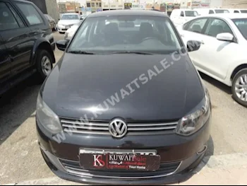 Volkswagen  Polo  2013  89,000  Sedan  Automatic  4  Cloth  FWD  Gray  Gasoline