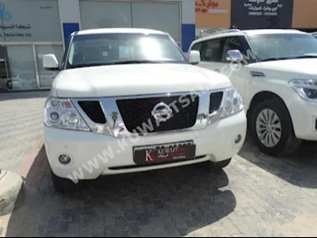 نيسان  اس اي  باترول  2013  69,000  اس يو في  اتوماتك  8  جلد  دفع رباعي  أبيض  بنزين