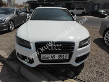 Audi  3.0 T  A5  2010  55,000  Sedan  Automatic  6  Leather  RWD  White  Gasoline