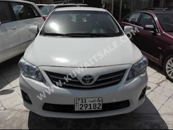 Toyota  XLI  Corolla  2013  56,000  Sedan  Automatic  4  Cloth  FWD  White  Gasoline
