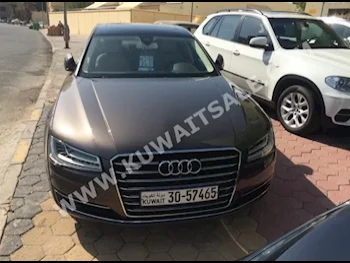 Audi  3.0  A8  2015  26,000  Sedan  Automatic  8  Leather  4WD  Brown  Gasoline