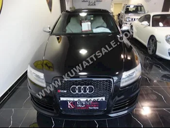اودي  6  أر أس  2010  40,000  سيدان  اتوماتك  8  جلد  دفع رباعي  أسود  بنزين
