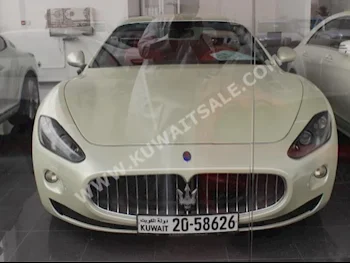 Maserati  GranTurismo  2013  46,000  Coupe / Sport  Automatic  8  Leather  RWD  Pearl  Gasoline