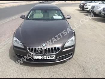 BMW  640i  6-Series  2013  98,000  SUV  Automatic  6  Leather  RWD  Brown  Gasoline