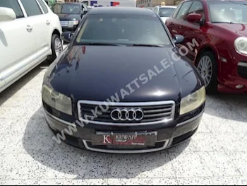 اودي  أل  أي 8  2004  160,000  سيدان  اتوماتك  6  جلد  دفع خلفي  أزرق غامق  بنزين