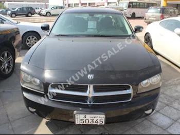 دودج  تشارجر  2010  146,000  سيدان  اتوماتك  6  مخمل  دفع خلفي  أسود  بنزين