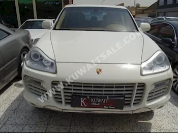 بورش  كايمان  2008  170,000  اس يو في  اتوماتك  6  جلد  دفع رباعي  أبيض  بنزين