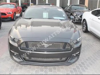 Ford  GT  Mustang  2015  35,000  Coupe / Sport  Manual  8  Leather  RWD  Gray  Gasoline