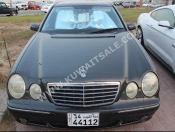 Mercedes-Benz  55 AMG  E-Class  2002  170,000  Sedan  Automatic  6  Leather  RWD  Black  Gasoline
