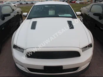 Ford  GT  Mustang  2013  55,000  Coupe / Sport  Manual  8  Leather  RWD  White  Gasoline