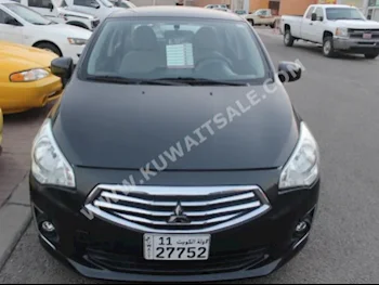 Mitsubishi  Attrage  2014  50,000  Sedan  Automatic  3  Cloth  FWD  Black  Gasoline
