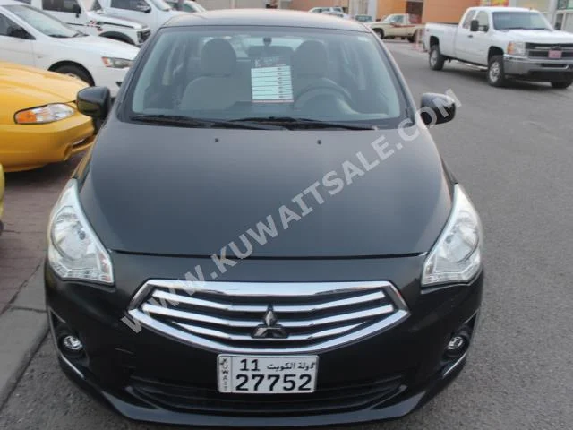 Mitsubishi  Attrage  2014  50,000  Sedan  Automatic  3  Cloth  FWD  Black  Gasoline