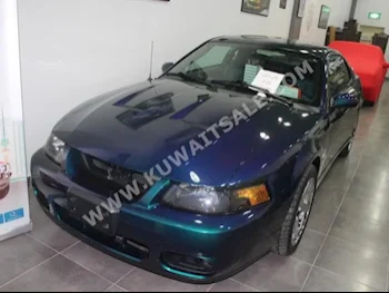 Ford  Cobra  2004  47,000  Coupe / Sport  Manual  8  Leather  RWD  Dark Blue  Gasoline