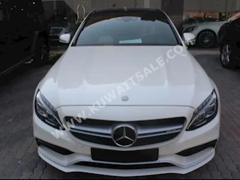 مرسيدس - بنز  63 AMG  سي - كلاس  2016  35,000  سيدان  اتوماتك  8  جلد  دفع خلفي  أبيض  بنزين