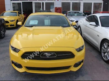 Ford  GT  Mustang  2015  10,000  Coupe / Sport  Manual  8  Leather  RWD  Yellow  Gasoline