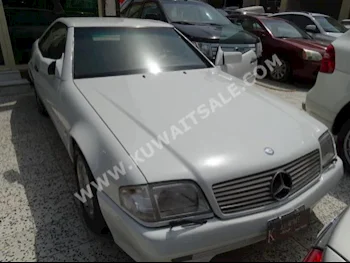 مرسيدس - بنز  500  اس ال - كلاس  1996  230,000  كوبيه \ سبورت  اتوماتك  8  جلد  دفع خلفي  أبيض  بنزين