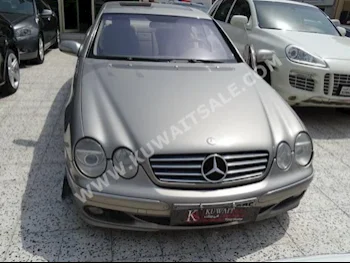 مرسيدس - بنز  500  سي ال اس - كلاس  2003  160,000  كوبيه \ سبورت  اتوماتك  8  جلد  دفع خلفي  ذهبي  بنزين