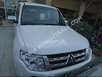 Mitsubishi  Pajero  2013  114,000  SUV  Automatic  6  Cloth  RWD  Gray  Gasoline