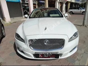 جاكوار  ال  اكس ج  2011  120,000  سيدان  اتوماتك  6  جلد  دفع خلفي  أبيض  بنزين