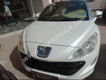 بيجو  ار سي زد  2013  21,000  كوبيه \ سبورت  اتوماتك  4  جلد  دفع أمامي  أبيض  بنزين