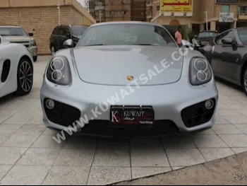 بورش  كايمان اس  كايمان  2015  74,000  كوبيه \ سبورت  اتوماتك  6  جلد  دفع خلفي  فضي  بنزين