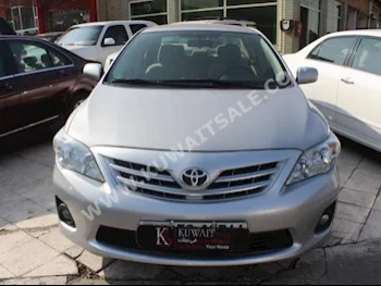 Toyota  XLI  Corolla  2013  57,000  Sedan  Automatic  4  Cloth  FWD  Silver  Gasoline