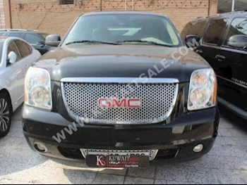 GMC  Yukon  2010  39,000  SUV  Automatic  8  Cloth  4WD  Black  Gasoline