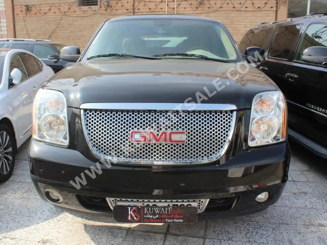 GMC  Yukon  2010  39,000  SUV  Automatic  8  Cloth  4WD  Black  Gasoline