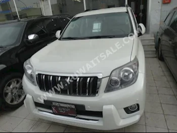 تويوتا  في اكس  برادو  2011  100,000  اس يو في  اتوماتك  6  جلد  دفع رباعي  أبيض  بنزين