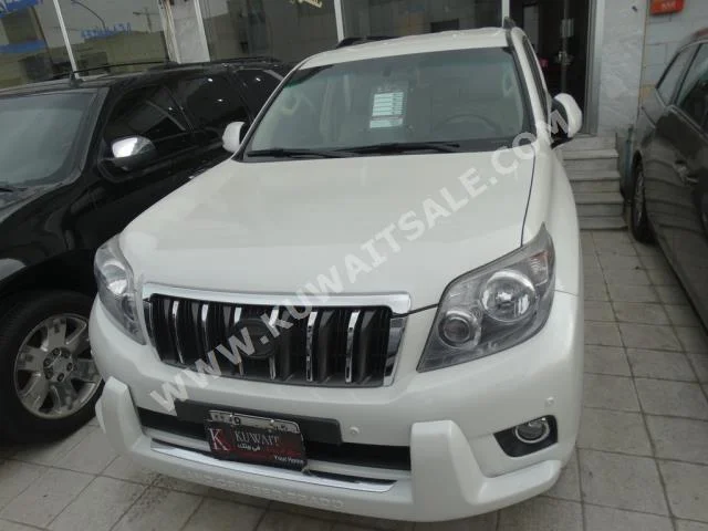 Toyota  VX  Prado  2011  100,000  SUV  Automatic  6  Leather  4WD  White  Gasoline