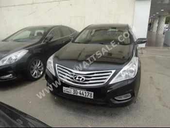 Hyundai  Azera  2014  46,000  SUV  Automatic  4  Leather  FWD  Black  Gasoline