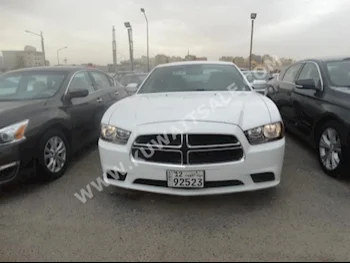 Dodge  Charger  2014  50,000  Sedan  Automatic  6  Cloth  RWD  White  Gasoline