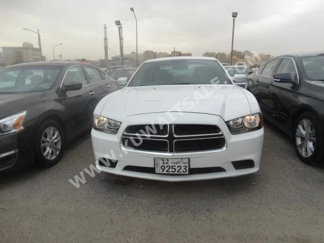 Dodge  Charger  2014  50,000  Sedan  Automatic  6  Cloth  RWD  White  Gasoline