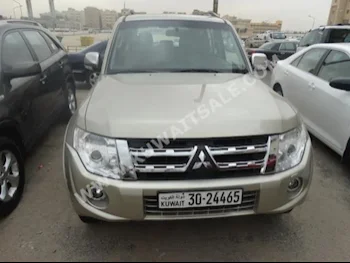 Mitsubishi  GLS  Pajero  2014  65,000  Sedan  Automatic  6  Cloth  FWD  Gold  Gasoline